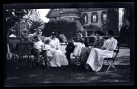 [Thomas C. Potts, Janet Morris, Jane Rhoads Morris seated on chairs on lawn], On Rancocas, NJ [graphic].