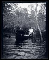 [Canoe carrying two men, Atsion River, New Jersey] [graphic].