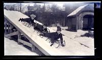 [Elliston Perot Morris Jr. and Marriott Canby Morris Jr. sledding, 131 W. Walnut Lane] [graphic].