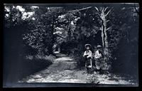[Marriott Canby Morris Jr. and Elliston Perot Morris Jr. on a path], Sea Girt, NJ [graphic].