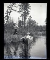 [Woman in a canoe, Atsion River, New Jersey] [graphic].