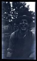 [Portrait of a laughing man], canoeing, Egg Harbor River, NJ [graphic].
