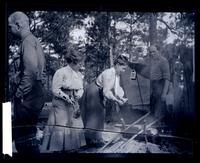 [Group building a fire] Canoeing, Egg Harbor River, NJ [graphic].