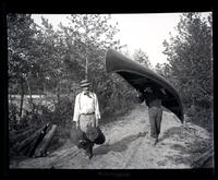 [Carrying a canoe, Atsion River, New Jersey] [graphic].
