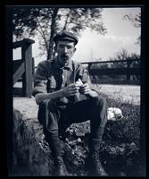 [Portrait of a seated man], canoeing, Egg Harbor River, NJ [graphic].