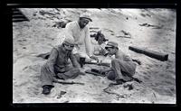 [Elliston Perot Morris Jr., Thomas C. Potts, Helen Dickey Potts, and Marriott Canby Morris Jr. playing in the sand], Sea Girt, NJ [graphic].
