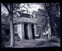 [Group in front of a building], canoeing, Egg Harbor River, NJ [graphic].