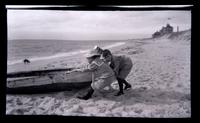 [Pulling the boat ashore, likely Elliston P. Morris Jr. and Marriott C. Morris Jr., Sea Girt] [graphic].