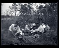 [Men and women around a campfire, Egg Harbor River, New Jersey] [graphic].