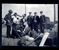 [Group posing with luggage], canoeing, Egg Harbor River, NJ [graphic].