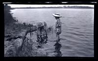 [Marriott Canby Morris Jr. and Helen Dickey Potts wading], Sea Girt, NJ [graphic].