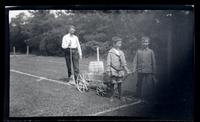 [Marriott C. Morris, Elliston Perot Morris Jr., and Marriott Canby Morris Jr. pulling wagon with barrel, Sea Girt] [graphic].