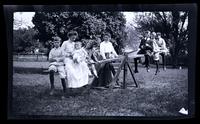 Group on see saw, Meadow Farm, [including Jane Rhoads Morris and Marriott Canby Morris Jr. Darlington, MD] [graphic].