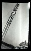 [Man ascending ladder, Sea Girt] [graphic].