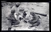 [Elliston Perot Morris Jr., Thomas C. Potts, Helen Dickey Potts, and Marriott Canby Morris Jr. playing in the sand], Sea Girt, NJ [graphic].