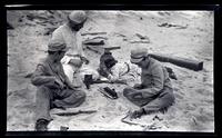 [Elliston Perot Morris Jr., Thomas C. Potts, Helen Dickey Potts, and Marriott Canby Morris Jr. playing in the sand], Sea Girt, NJ [graphic].