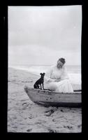 [Woman, probably Elizabeth Canby Morris, and dog in boat, Sea Girt] [graphic].