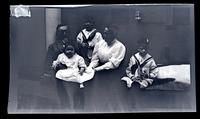 [Group portrait of Elliston Perot Morris, Elliston Perot Morris Jr., Marriott Canby Morris Jr., and Janet Morris] [graphic].