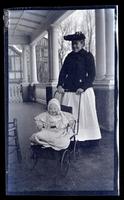 [Woman with Janet Morris in carriage, 131 W. Walnut Lane] [graphic].