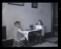 [Marriott C. Morris, Jr. and Elliston P. Morris, Jr. at small table set for a meal] [graphic].