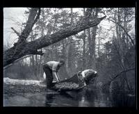 [Two men with a canoe at the water's edge, Egg Harbor River, New Jersey] [graphic].