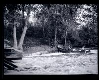 [Two canoes near a dock], canoeing, Egg Harbor River, NJ [graphic].