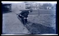 [Boy with rake, 131 W. Walnut Lane] [graphic].