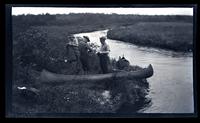 [Canoes on the riverbank], canoeing, Egg Harbor River, NJ [graphic].