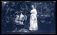 [Martha Canby Morris, Elliston P. Morris Jr. and Marriott C. Morris Jr. and a woman near a fence, Sea Girt, NJ] [graphic].