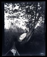 [Woman leaning against a tree, Atsion River, New Jersey] [graphic].