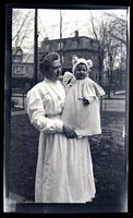 [Woman holding a baby] [graphic].