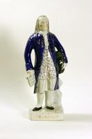 Benjamin Franklin figurine.