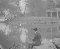 [Man fishing, Wissahickon Creek?, Fairmount Park] [graphic].