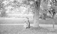 [Bertha T. Webster, with Anna B. Taylor on a swing, Mt. Equity, Pennsdale, Pa.] [graphic].