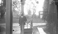 [Charles Ellis Ecroyd? on porch of Mount Equity, Pennsdale, Pa.] [graphic].