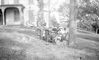 [Group sitting on lawn weaving branches, Mt. Equity, Pennsdale, Pa.] [graphic].