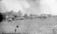 [Hay bales, with view of the farm behind Stouton, Philadelphia, Pa.] [graphic].
