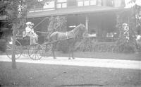 [Jane L. Webster sitting with a woman in a horse-drawn buggy] [graphic].