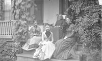 [Jane L. Webster, with "The Aunties" on the porch of a residence, Lownes Clovercrest Farm, Springfield township, Pa.] [graphic].