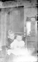 [Mabel C. Webster holding Lydia S. Webster in John H. Webster, Jr. residence at 4830 Penn Street, Philadelphia, Pa.] [graphic].