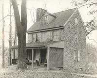 [Exterior view of stone house in rural setting] [graphic].