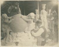 [Marble carvers in their workshop sculpting cherub figures and caryatids for Entresol floor of the Pennsylvania capitol building.] [graphic].