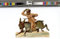 [African American man riding a donkey] [graphic].