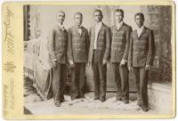 [Portrait of five African American men attired in uniforms, probably band uniforms] [graphic] / Harry A. Webb, 112 & 114 Nth. 9th St. Philadelphia, Pa.