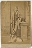 [Unidentified African American man with a dog]