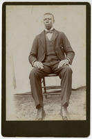 [Well-dressed unidentified African American man]
