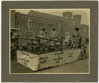 [Charles J. Webb Company float during a parade along a Philadelphia street]