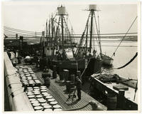 [Dock workers transporting ice on a pier in Philadelphia]