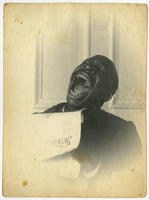 [Caricature of a laughing African American man]