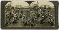 Cars loaded with cotton bales on levee near cotton growing district, Texas.